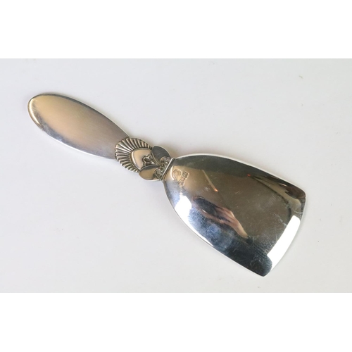 178 - A Georg Jensen sterling silver cactus pattern caddy spoon, marked Georg Jensen, Sterling Denmark to ... 