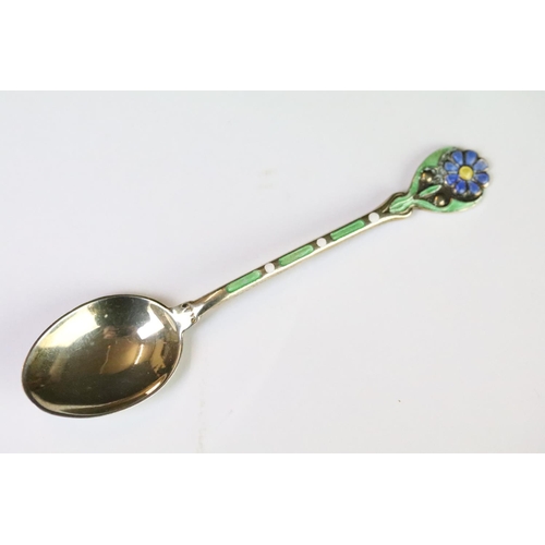 210 - A cased set of six fully hallmarked sterling silver and enamel teaspoons, floral patterned finials w... 