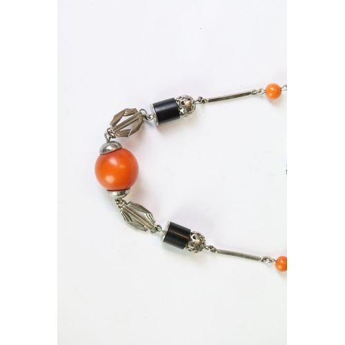 220 - A 1930's Bauhaus Chrome and Bakelite necklace, attributed to German designer Jakob Bengal.