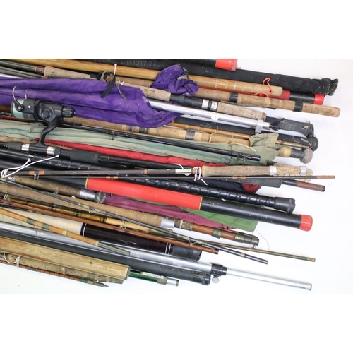 417 - A vary large collection of vintage and contemporary fishing rods to include split cane examples.