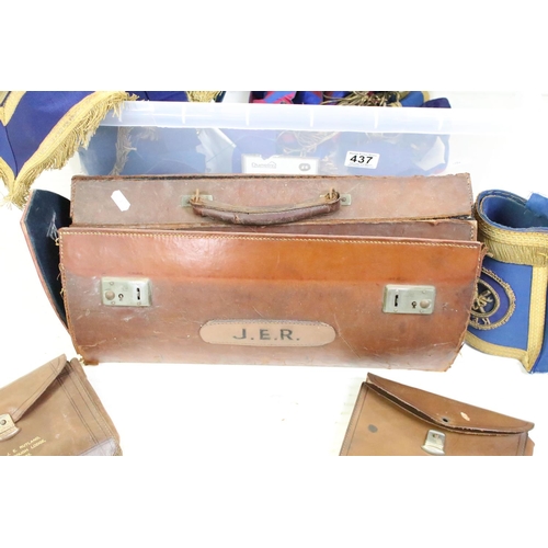 437 - Collection of Masonic items to include aprons, gloves and sashes helped within a leather bag .