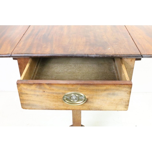 652 - Mahogany Drop Flap Table in the Regency manner with drawer to one end, raised on two supports each w... 