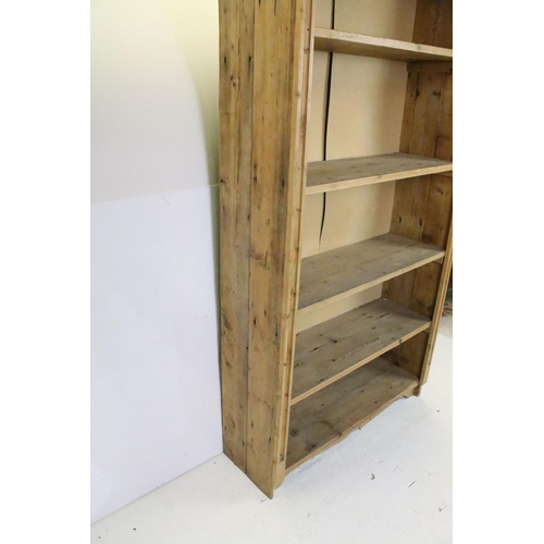 668 - Large Pine Bookcase with five shelves, 179cm high x 97cm wide x 33cm deep