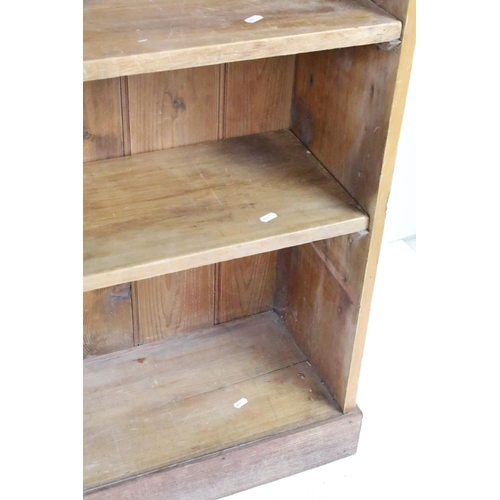 669 - Large Pine Panelled Back Bookcase with three shelves, 107cm high x 160cm long x 37cm deep