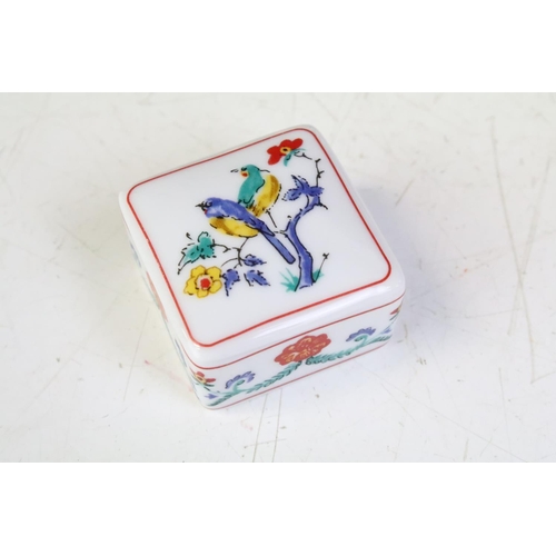 329 - A large collection of Del Prado ceramic trinket boxes and miniature teapots, all marked to bases. Th... 