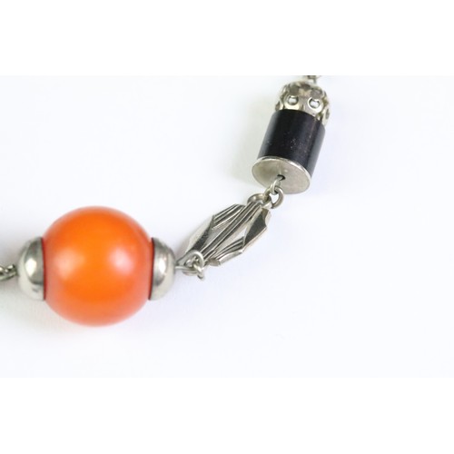 220 - A 1930's Bauhaus Chrome and Bakelite necklace, attributed to German designer Jakob Bengal.