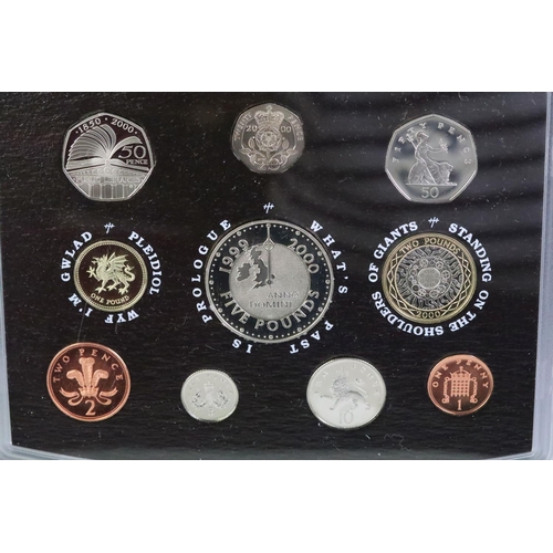 105 - A small group of Royal Mint collectors coins packs to include the 2000 De-Luxe set, 2012 Queen's Dia... 