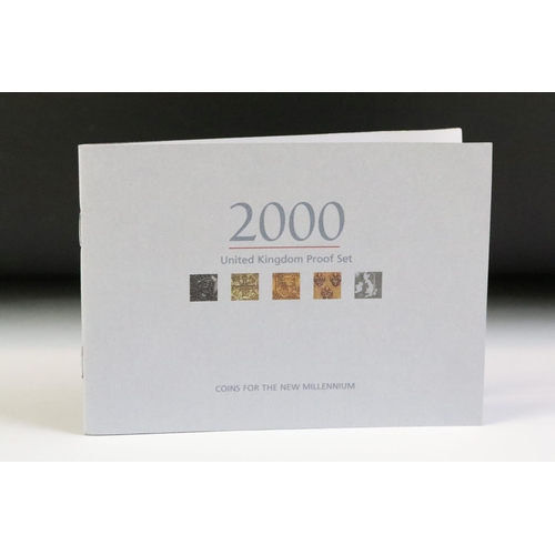 105 - A small group of Royal Mint collectors coins packs to include the 2000 De-Luxe set, 2012 Queen's Dia... 