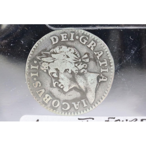 120 - A British King James II 1686 silver fourpence coin recovered from the shipwreck of the English flags... 