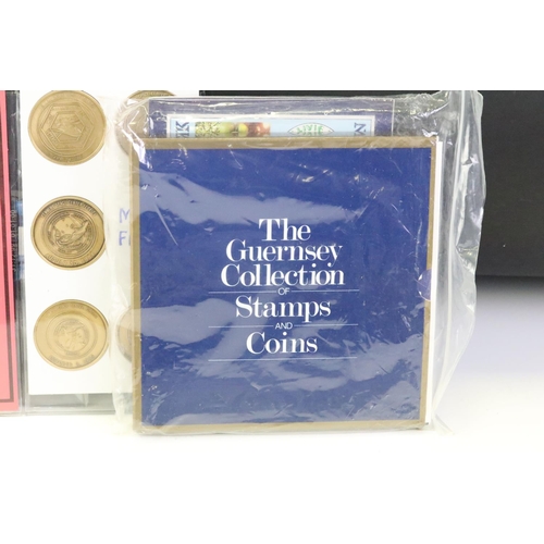 124 - A collection of uncirculated coin sets to include three Royal Mint year sets, coin covers and a Roya... 