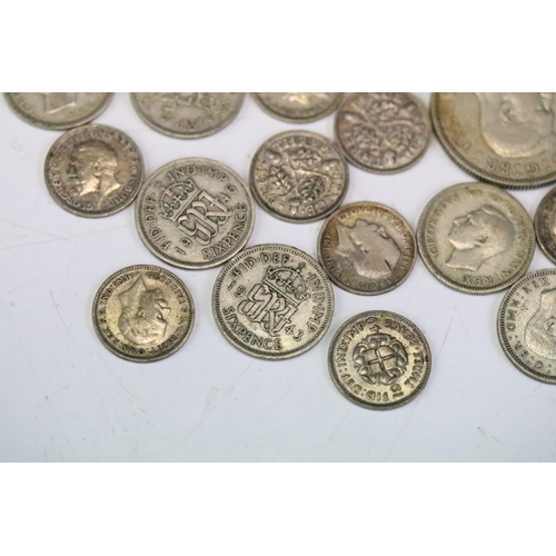 133 - A small collection of mainly British pre decimal silver coins to include Crown, half crowns, florin,... 