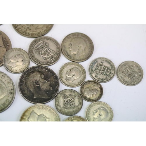 133 - A small collection of mainly British pre decimal silver coins to include Crown, half crowns, florin,... 