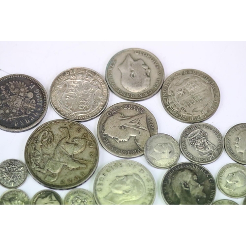 133 - A small collection of mainly British pre decimal silver coins to include Crown, half crowns, florin,... 