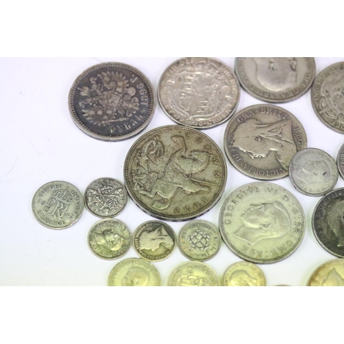 133 - A small collection of mainly British pre decimal silver coins to include Crown, half crowns, florin,... 