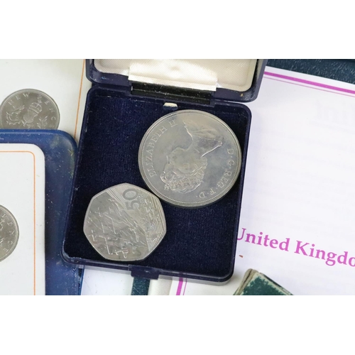 156 - A collection of mainly British mixed coins to include two proof year sets, two brilliant uncirculate... 