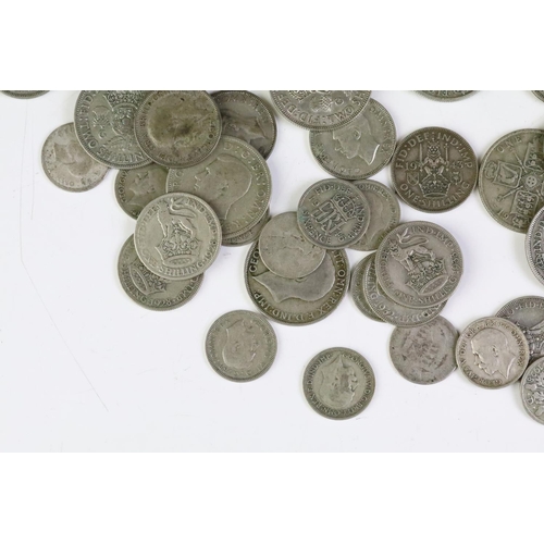 161 - A collection of British pre decimal silver coins to include half crowns, florins shillings and sixpe... 