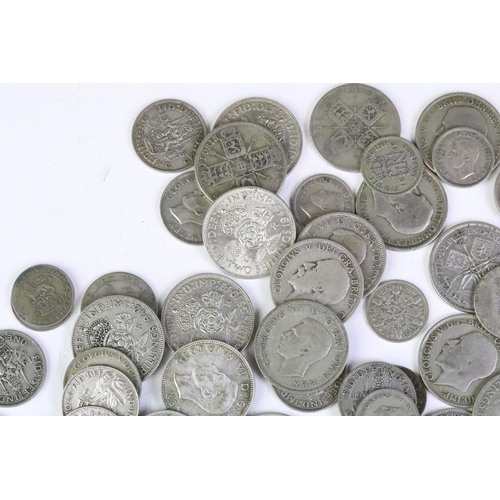 161 - A collection of British pre decimal silver coins to include half crowns, florins shillings and sixpe... 