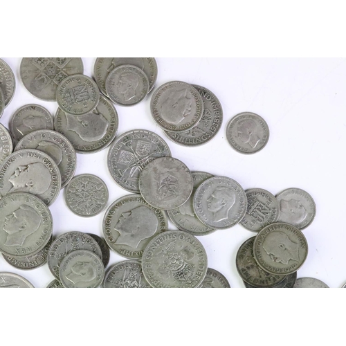 161 - A collection of British pre decimal silver coins to include half crowns, florins shillings and sixpe... 