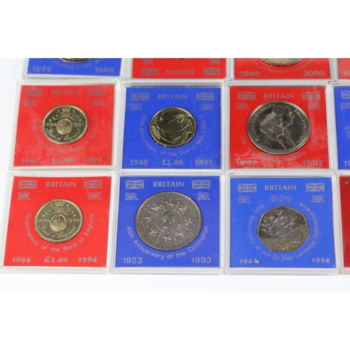 163 - A collection of British commemorative coins to include uncirculated commemorative crowns within caps... 