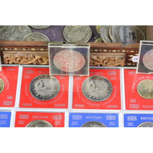 163 - A collection of British commemorative coins to include uncirculated commemorative crowns within caps... 