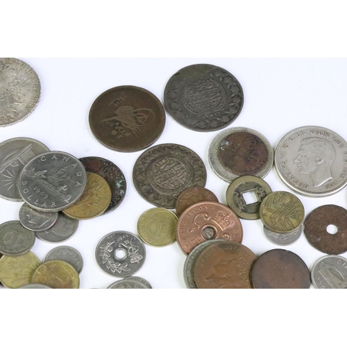 174 - A collection of mixed world coins to include early hammered and milled examples together with a sele... 