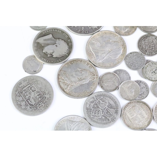 175 - A collection of British pre decimal silver coins to include King George III and Queen Victoria examp... 