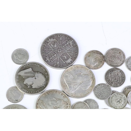 175 - A collection of British pre decimal silver coins to include King George III and Queen Victoria examp... 