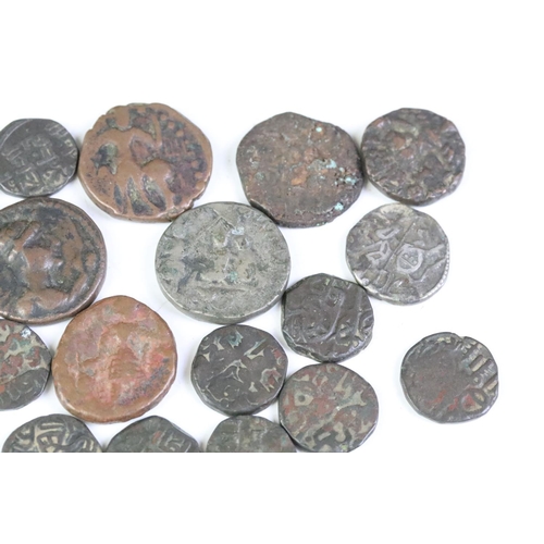 176 - A collection of ancient coins to include Roman examples.