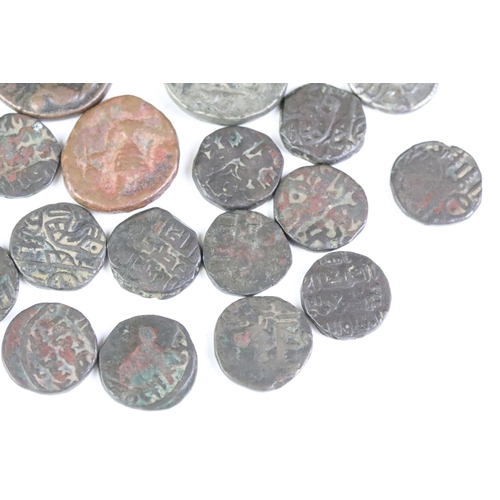 176 - A collection of ancient coins to include Roman examples.