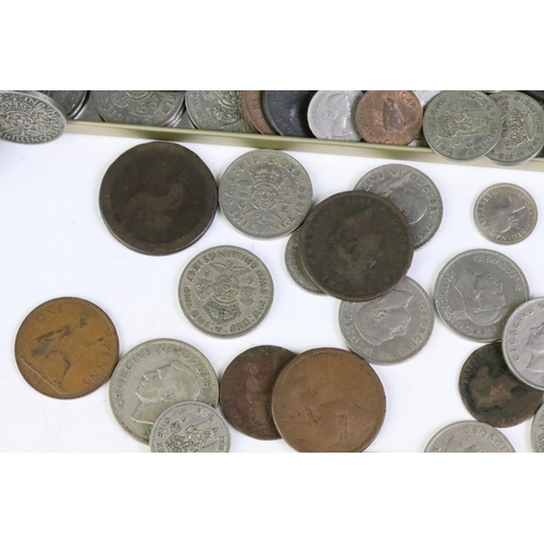 177 - A collection of mainly British pre decimal coins and tokens to include King George III and Queen Vic... 