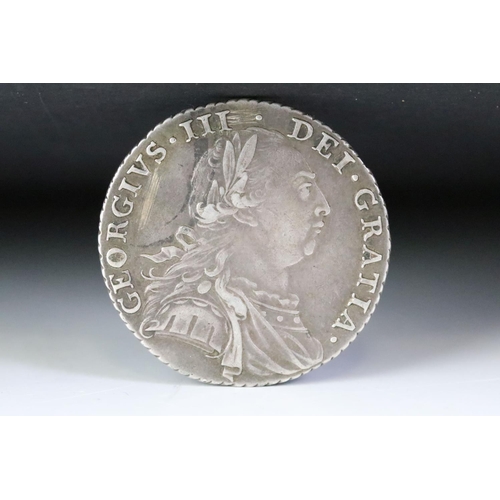 191 - A British King George III early milled 1737 silver shilling coin.