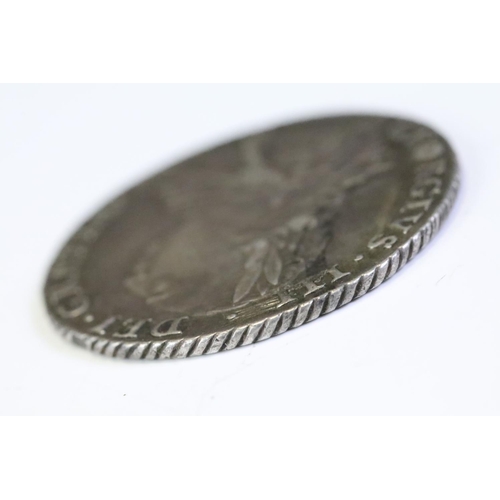 191 - A British King George III early milled 1737 silver shilling coin.