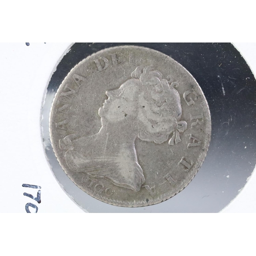 195 - A British Queen Anne 1703 silver shilling coin.