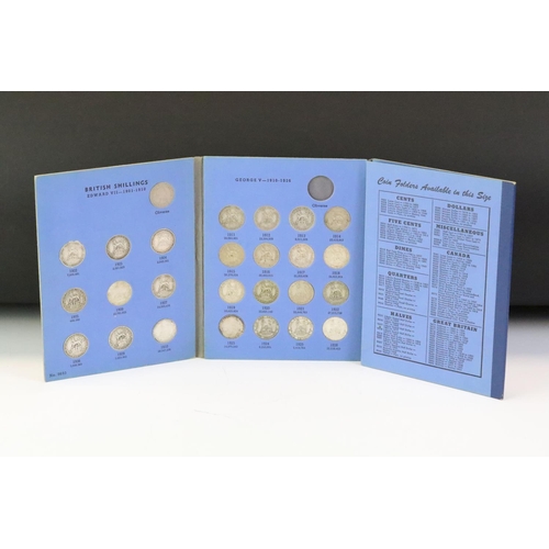 198 - A collection of British pre decimal coins within albums to include silver shillings and pennies.