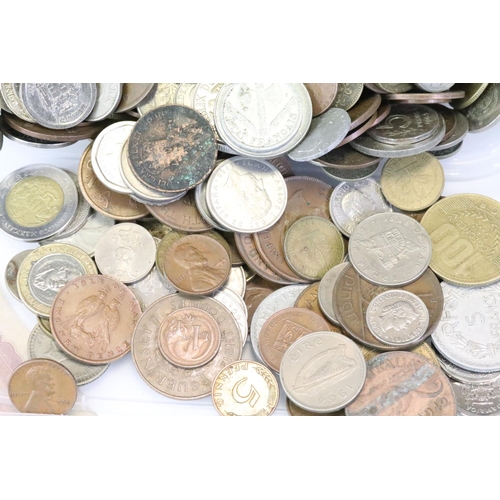 199 - A collection of World coins and banknotes to include early 20th century silver examples.