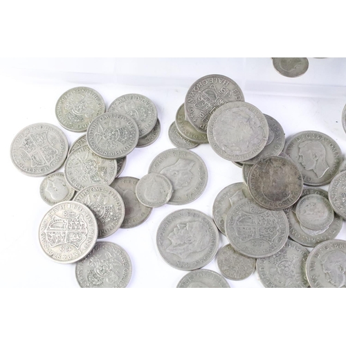 208 - A large collection of British pre decimal pre 1947 silver coins to include a good quantity of half c... 