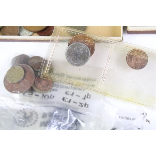 209 - A small collection of British and World coins to include uncirculated and early silver examples.