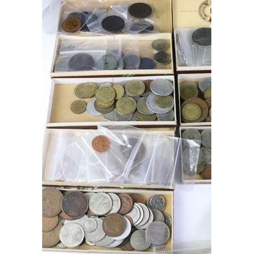 209 - A small collection of British and World coins to include uncirculated and early silver examples.