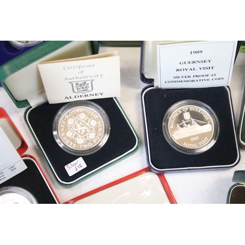 26 - A collection of cased uncirculated and proof coins to include silver proof examples.