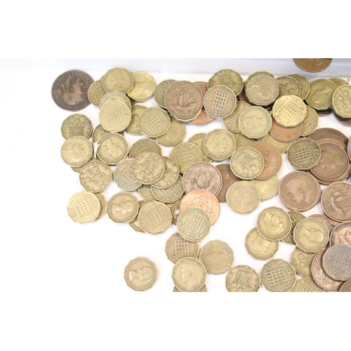 28 - A large collection of mainly British pre decimal coins to include Threepence, half penny and threepe... 