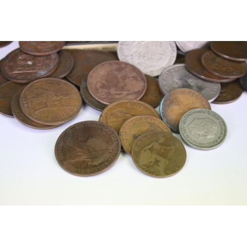 29 - A small collection of mainly British pre decimal coins to include some silver and Queen Victoria exa... 