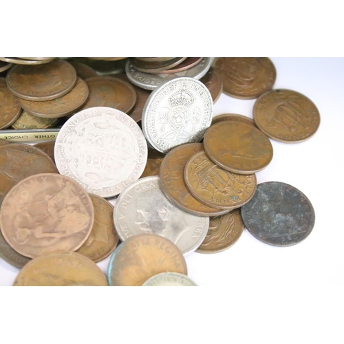 29 - A small collection of mainly British pre decimal coins to include some silver and Queen Victoria exa... 