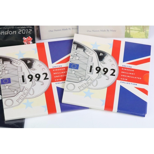 39 - A collection of Royal Mint Uncirculated coin sets to include six year sets, £5 coins, 50p coins and ... 