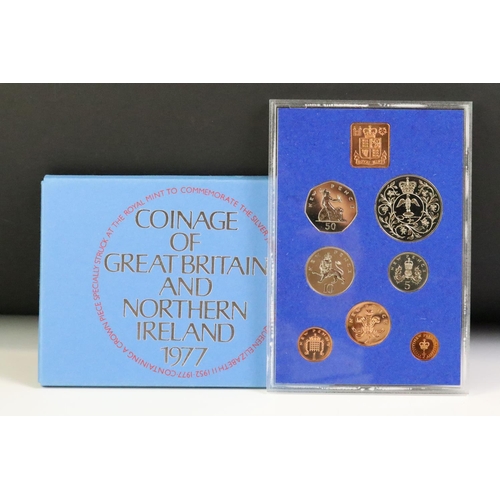 48 - A collection of seven Royal Mint brilliant uncirculated coin year sets to include 1982, 1981, 1980, ... 