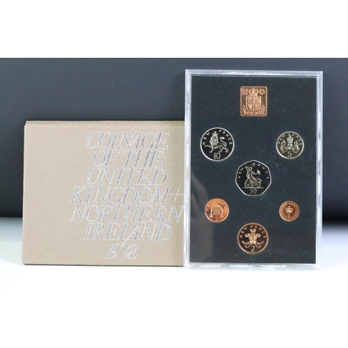 48 - A collection of seven Royal Mint brilliant uncirculated coin year sets to include 1982, 1981, 1980, ... 