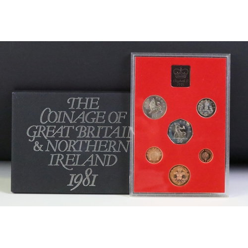 48 - A collection of seven Royal Mint brilliant uncirculated coin year sets to include 1982, 1981, 1980, ... 