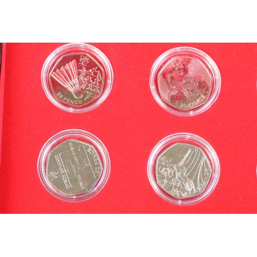 80 - A brilliant uncirculated 2012 olympic games 50p coin set together with the completer medallion, coin... 