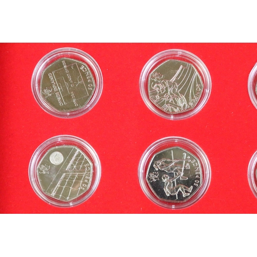 80 - A brilliant uncirculated 2012 olympic games 50p coin set together with the completer medallion, coin... 