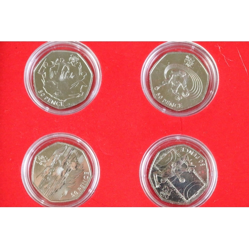 80 - A brilliant uncirculated 2012 olympic games 50p coin set together with the completer medallion, coin... 