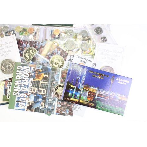 84 - A collection of mixed coins and banknotes to include proof and uncirculated world coin sets, Kenya h... 